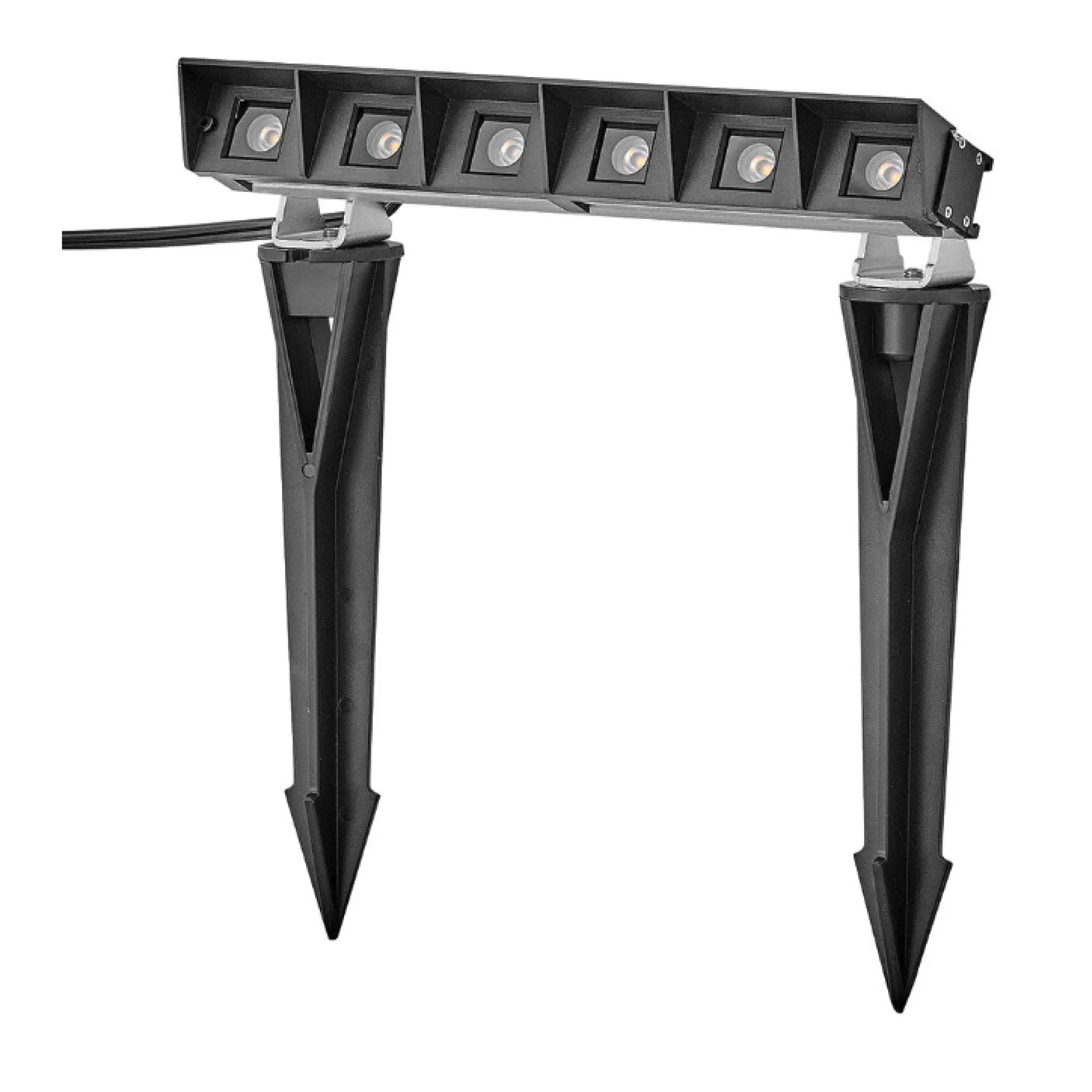 12V LED wall wash light with six recessed LEDs on a black bar and two ground stakes
