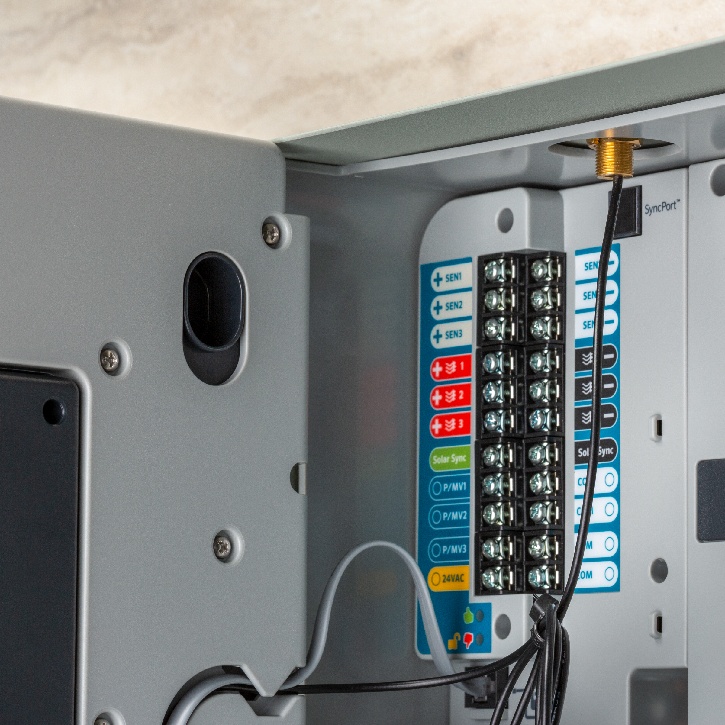 Plastic controller interior with wiring terminals and circuit board