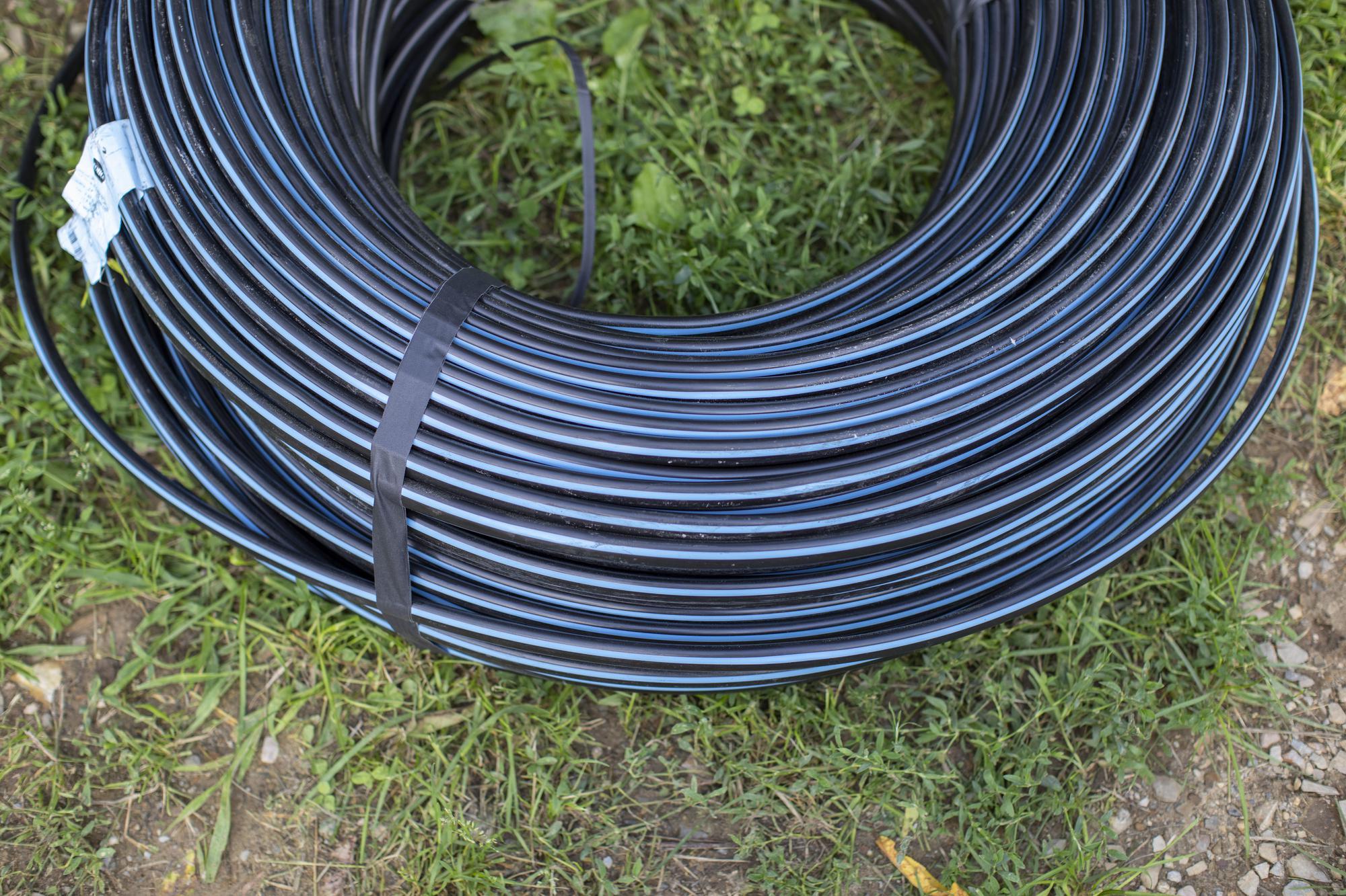 Blue-striped hose coil with binding strap, 1/2 in (15 mm)