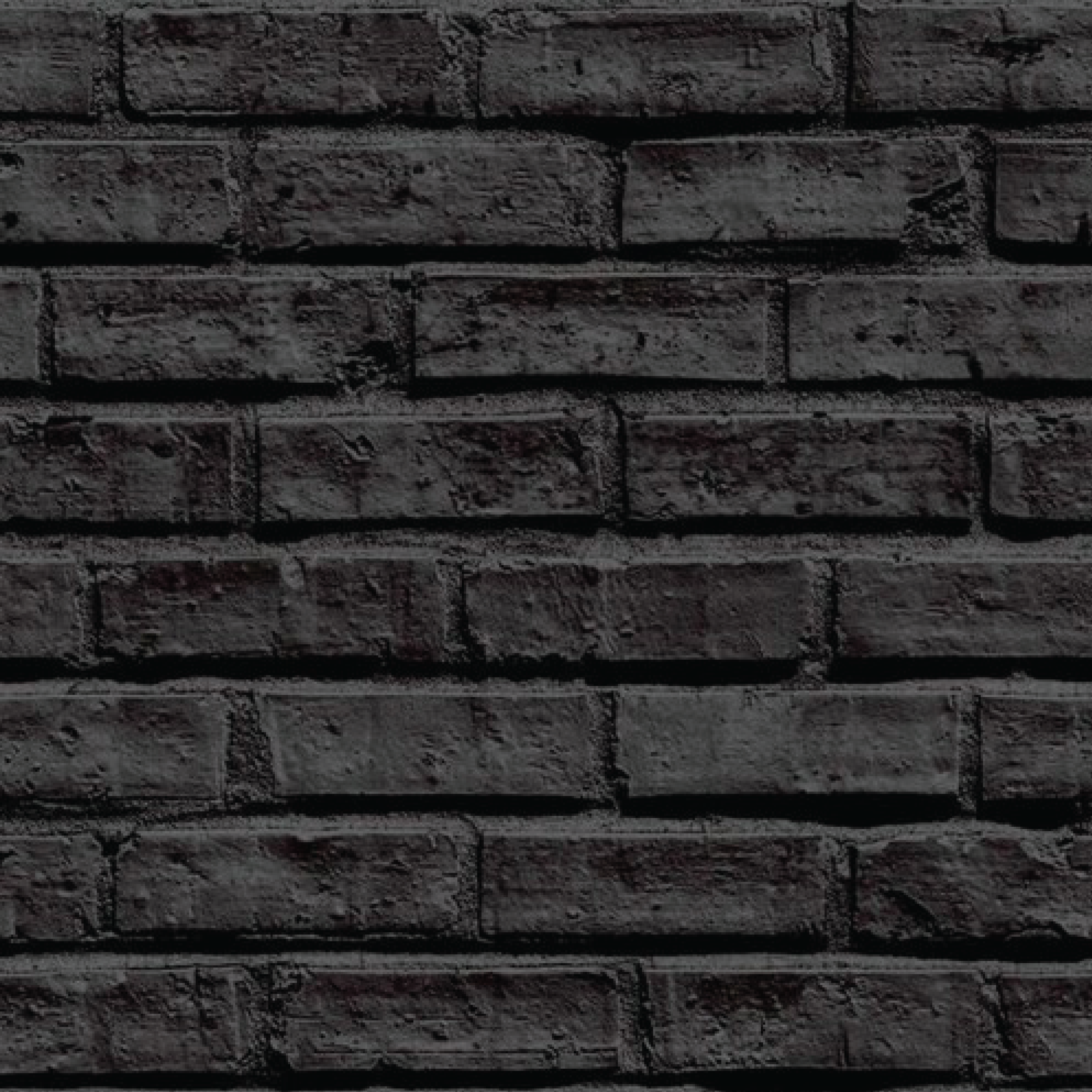 Volcanic black brick panel set with textured rectangular brick pattern