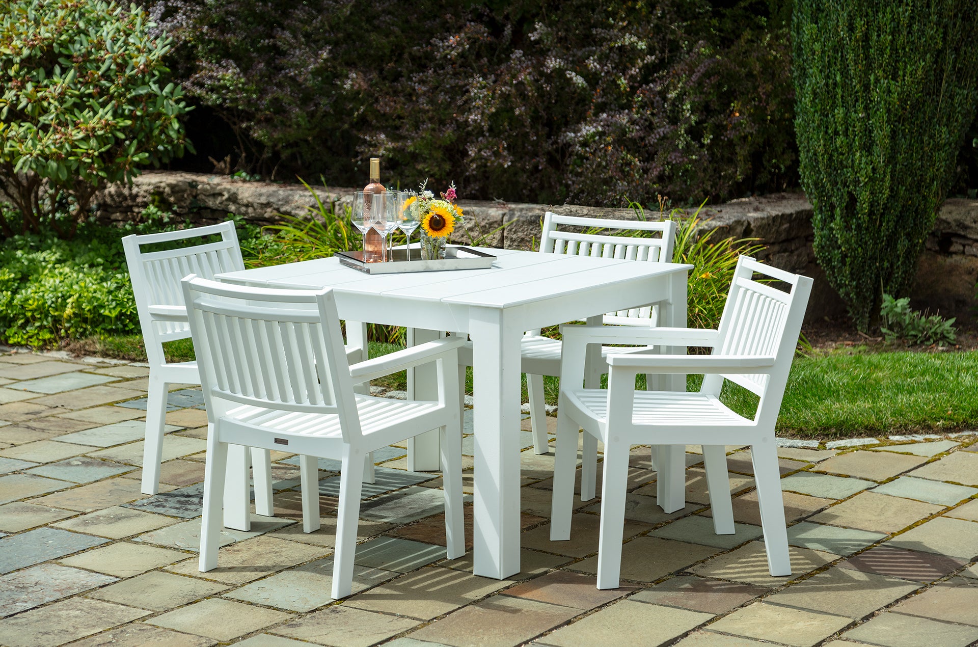 Square outdoor dining table, 42 in, white finish with chairs around